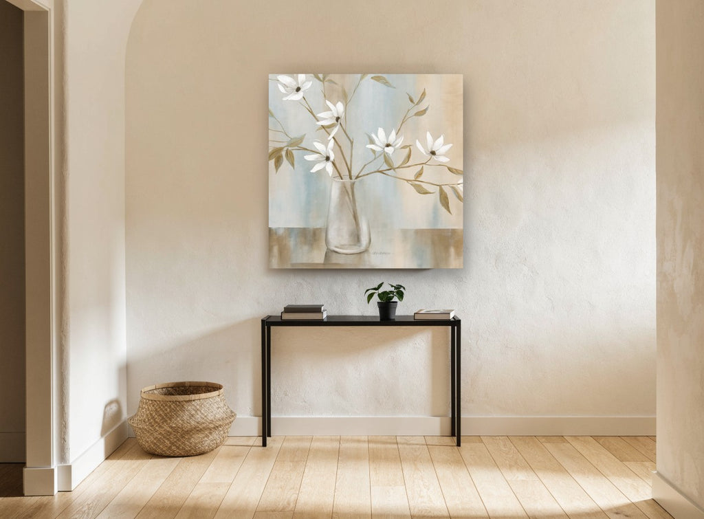 White Magnolia Stems in Glass floral canvas print on the wall of a hallway