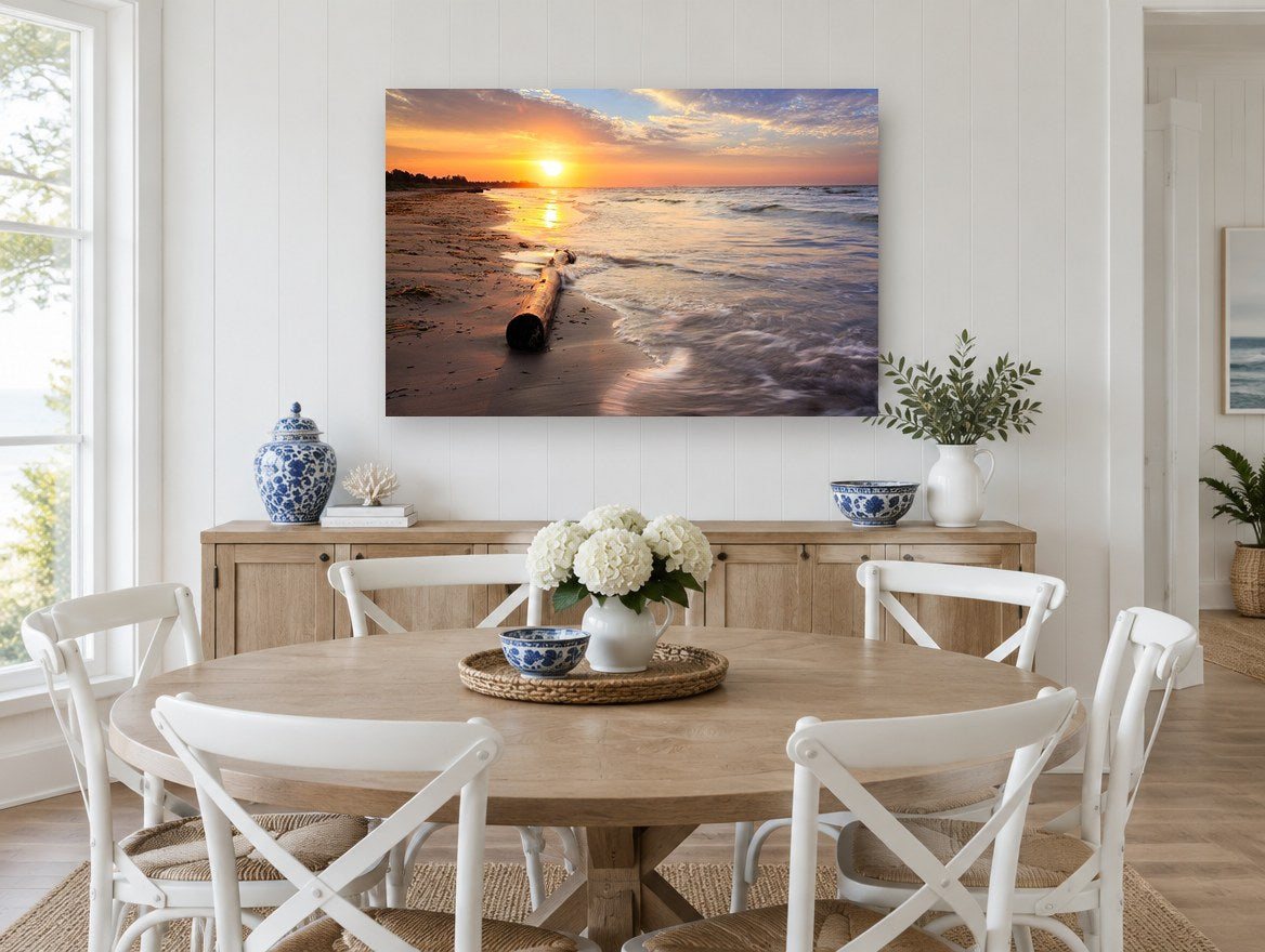 Driftwood at Dawn coastal canvas print on the wall of a Hamptons dining room