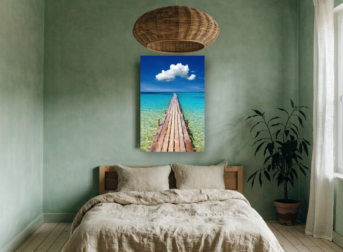 Turquoise Jetty Horizon coastal canvas print on the wall of a bedroom