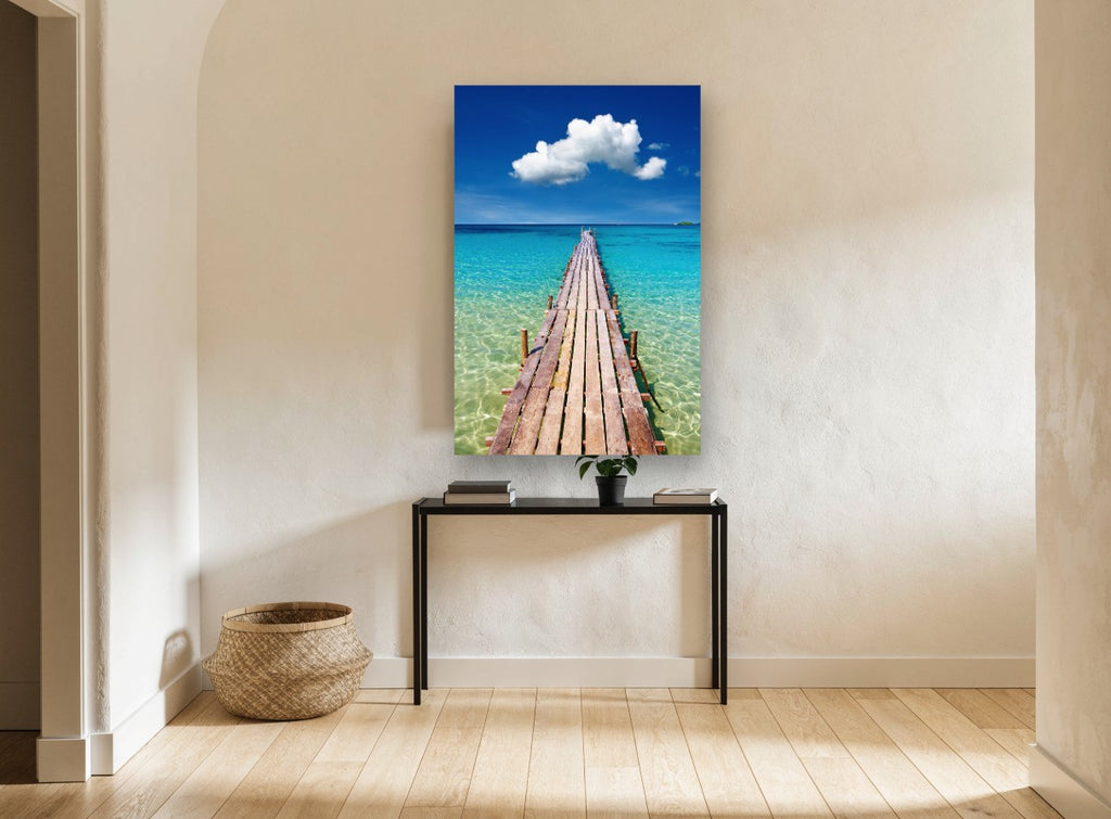 Turquoise Jetty Horizon coastal canvas print on the wall of a hallway
