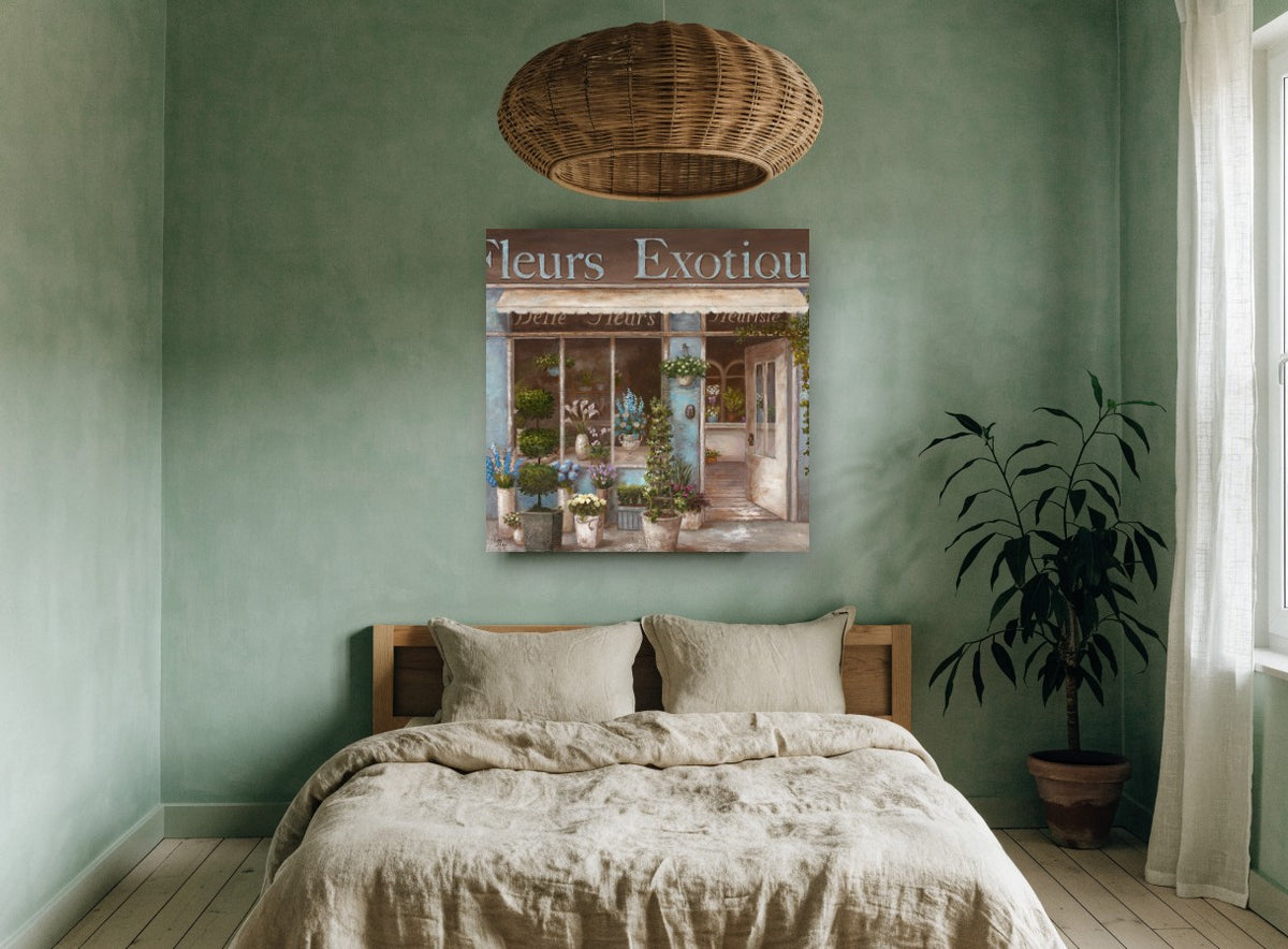 Blue Fleuriste Storefront floral canvas print on the wall of a bedroom