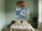 Blue Slate Blooms floral canvas print on the wall of a bedroom