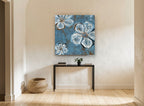 Blue Slate Blooms floral canvas print on the wall of a hallway