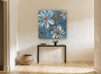 Blue Daisy Drift floral canvas print on the wall of a hallway
