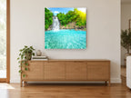 Turquoise Falls Lagoon landscape canvas print on the wall of a living room above a sideboard