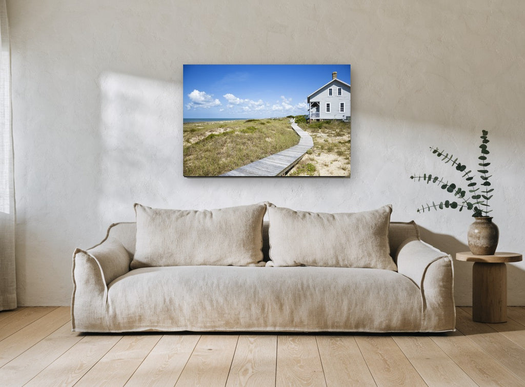 Boardwalk to the Dunes coastal canvas print on the wall of a living room