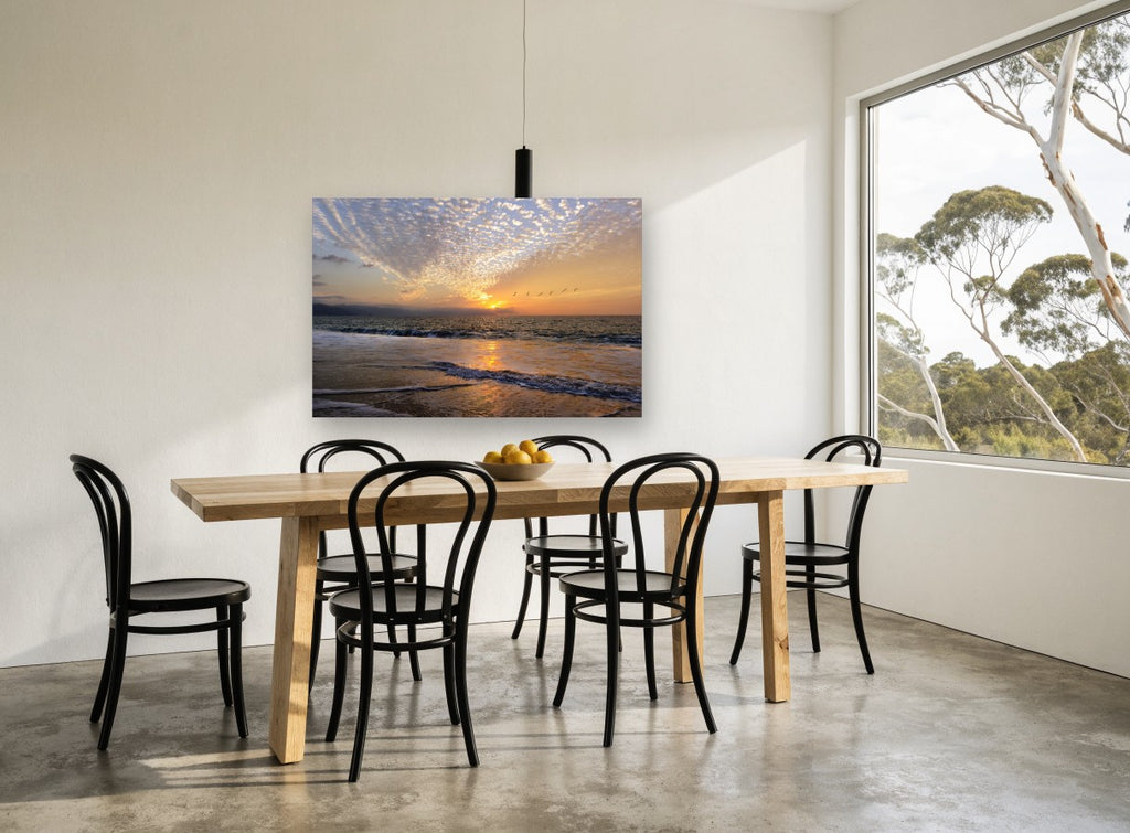 Pelicans at Sunset Shore coastal canvas print on the wall of a dining room