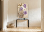 Lilac Tulips and Scroll Vase floral canvas print on the wall of a hallway
