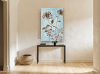 Brown Blooms on Blue floral canvas print on the wall of a hallway
