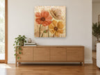 Warm Poppy Trio floral canvas print on the wall of a living room above a sideboard