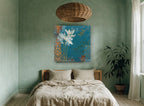 Dragonfly Over Teal Blooms floral canvas print on the wall of a bedroom