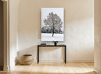 Snow-Laden Winter Tree floral canvas print on the wall of a hallway