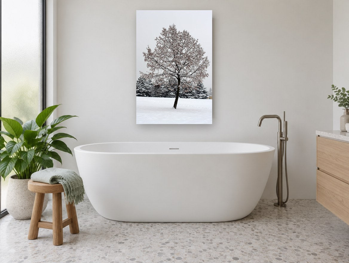 Snow-Laden Winter Tree floral canvas print on the wall of a bathroom