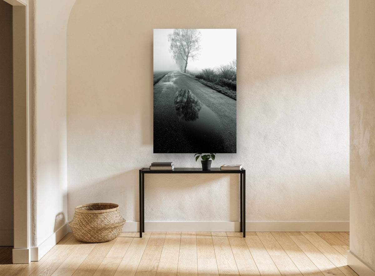 Puddle on the Fog Road landscape canvas print on the wall of a hallway
