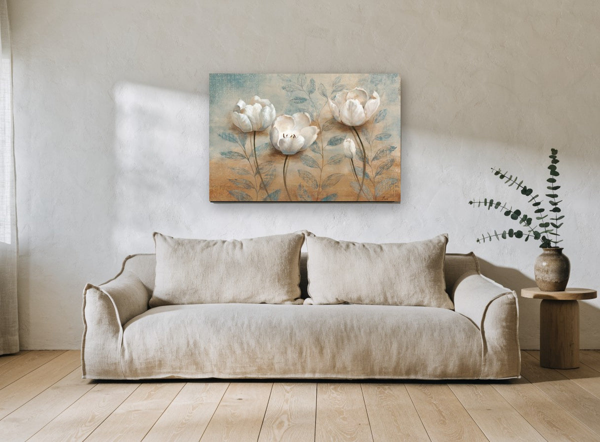 White Blooms on Teal floral canvas print on the wall of a living room
