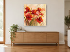 Red Blooms in Mist floral canvas print on the wall of a living room above a sideboard
