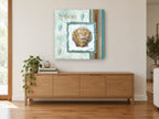 Scallop By The Sea coastal canvas print on the wall of a living room above a sideboard