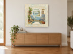 Seaside Bathroom Window coastal canvas print on the wall of a living room above a sideboard