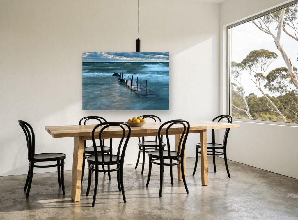 Storm Light Jetty coastal canvas print on the wall of a dining room