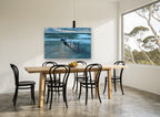 Storm Light Jetty coastal canvas print on the wall of a dining room