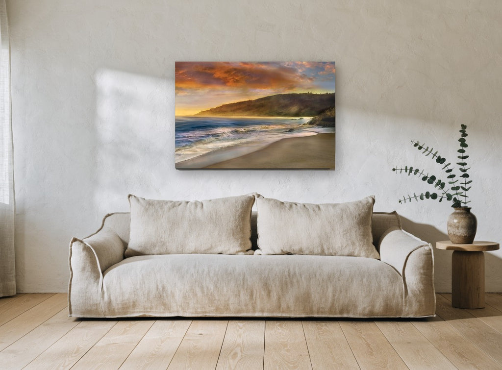 Malibu Sun Headland coastal canvas print on the wall of a living room