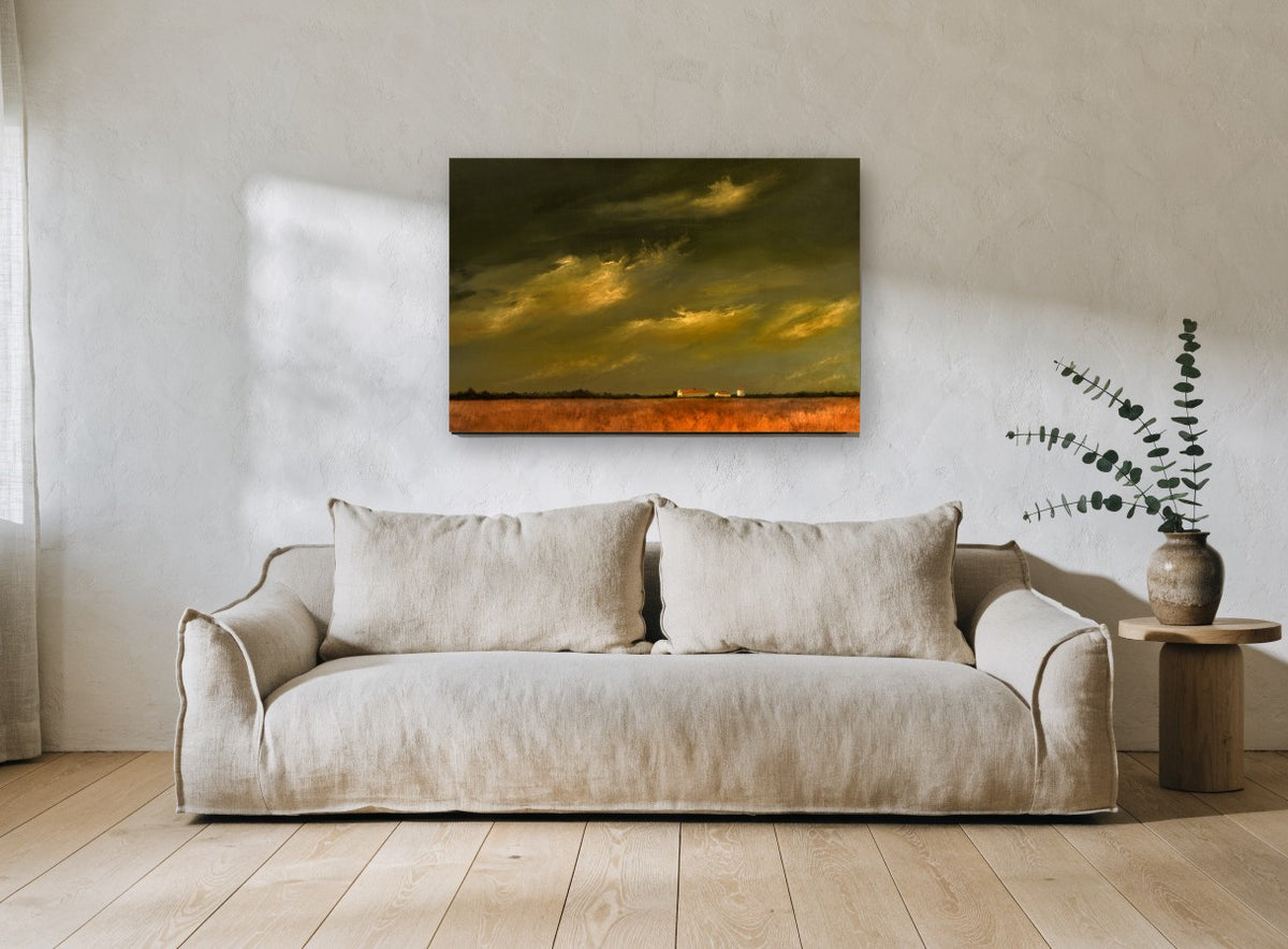 Farm Under Storm Light landscape canvas print on the wall of a living room