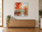 Amber Birch Reflections landscape canvas print on the wall of a living room above a sideboard