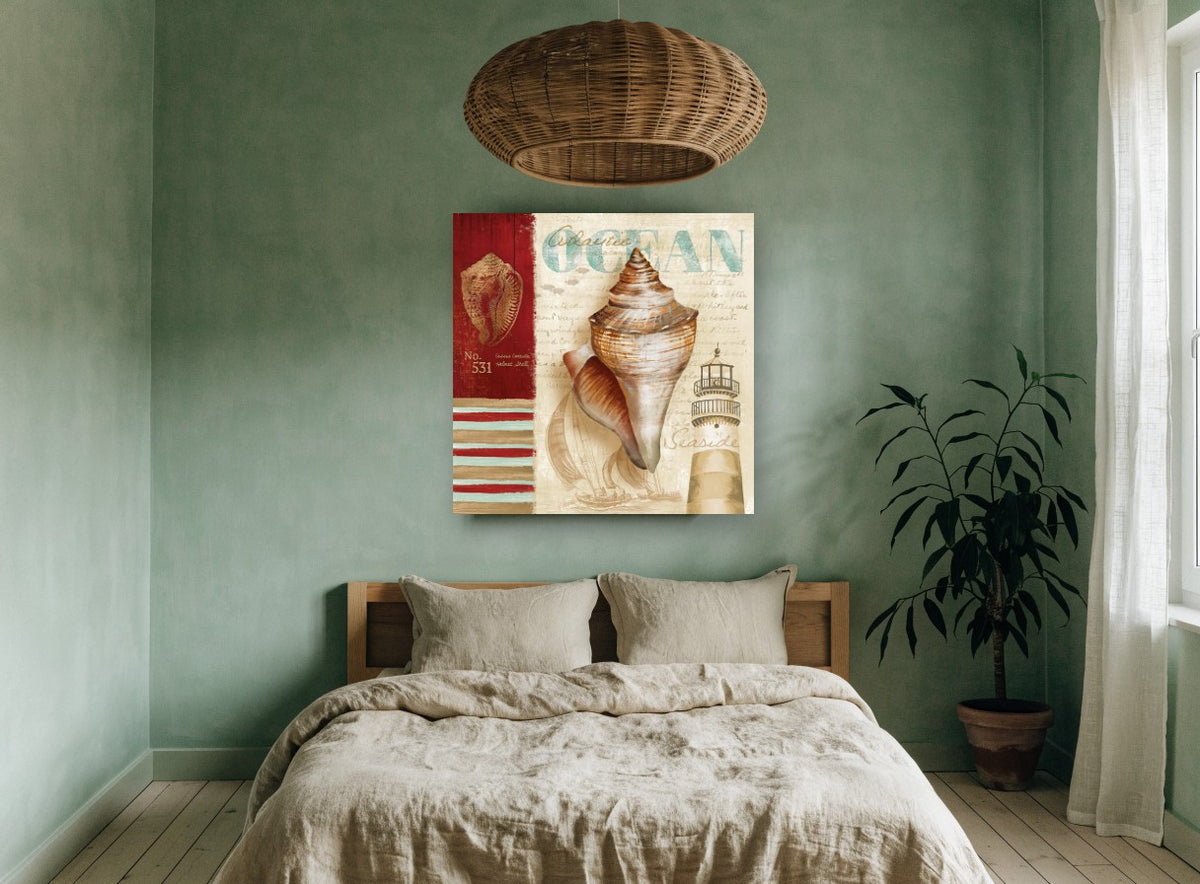 Shell and Lighthouse Collage coastal canvas print on the wall of a bedroom
