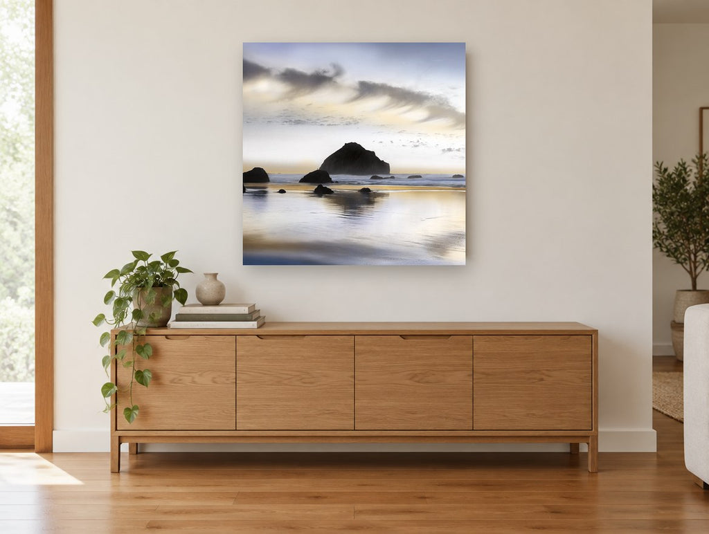 Twilight Sea Stack Shore coastal canvas print on the wall of a living room above a sideboard