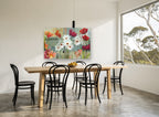 Weathered Wall Blooms floral canvas print on the wall of a dining room