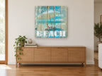 No Shoes Beach Sign coastal canvas print on the wall of a living room above a sideboard