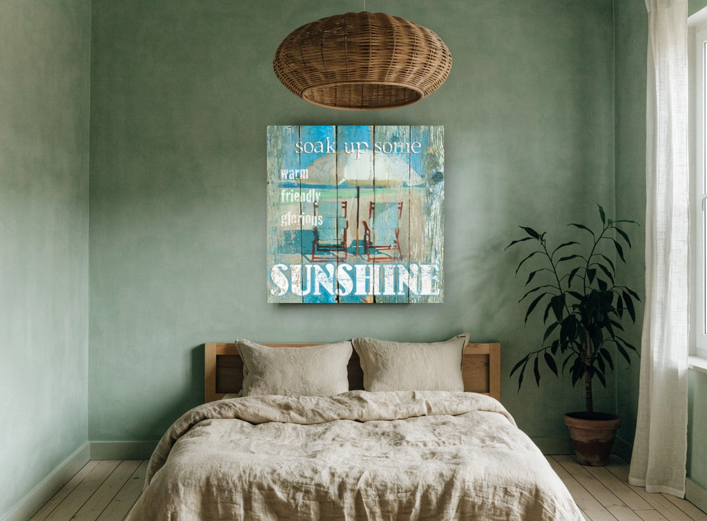 Sunshine Beach Chairs coastal canvas print on the wall of a bedroom
