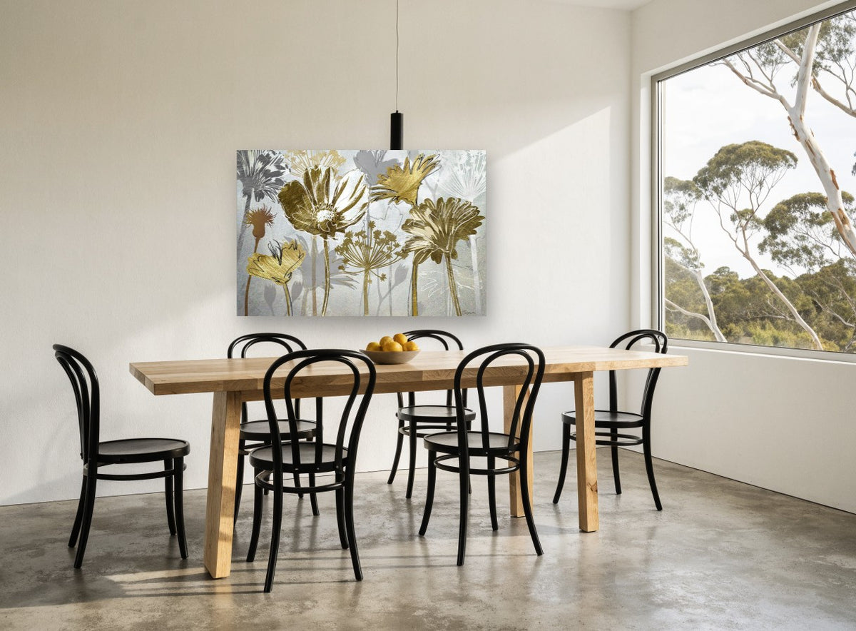 Gilded Meadow Silhouettes floral canvas print on the wall of a dining room