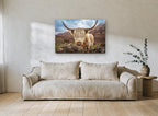 Shaggy Highland Cow landscape canvas print on the wall of a living room