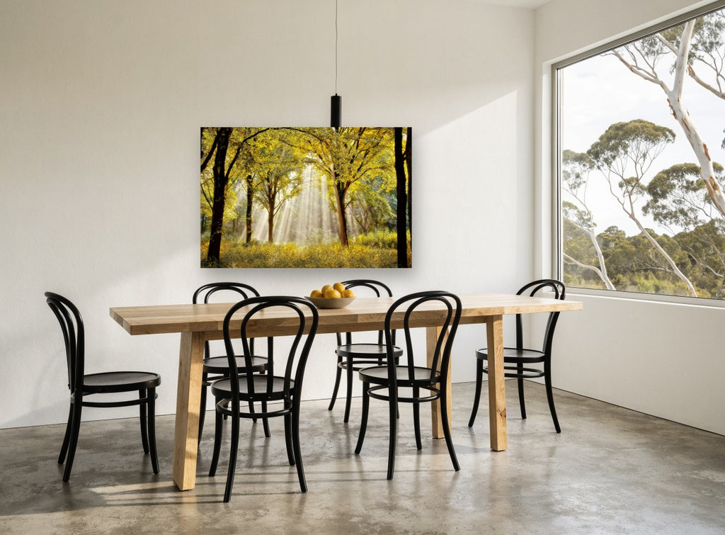 Golden Forest Light landscape canvas print on the wall of a dining room