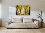 Golden Forest Light landscape canvas print on the wall of a living room