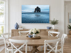 Arch at Low Tide coastal canvas print on the wall of a Hamptons dining room