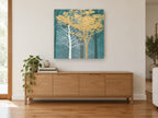 Gold and White Forest landscape canvas print on the wall of a living room above a sideboard