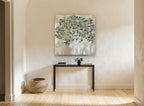Teal Dot Tree landscape canvas print on the wall of a hallway