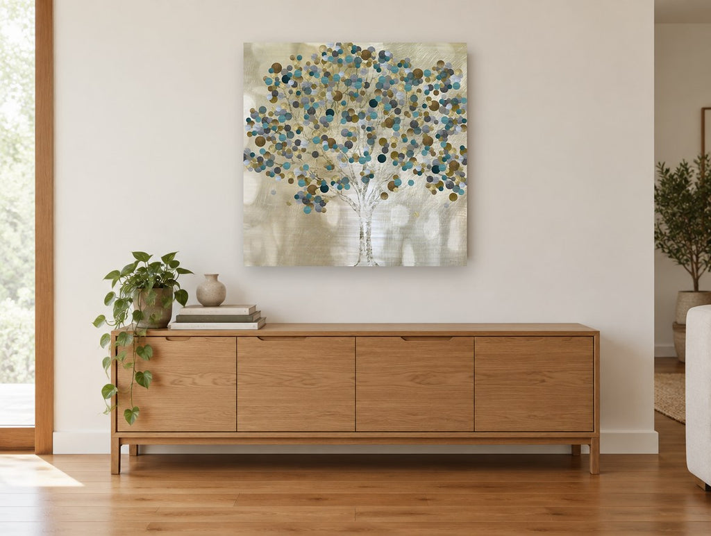 Teal Dot Tree landscape canvas print on the wall of a living room above a sideboard
