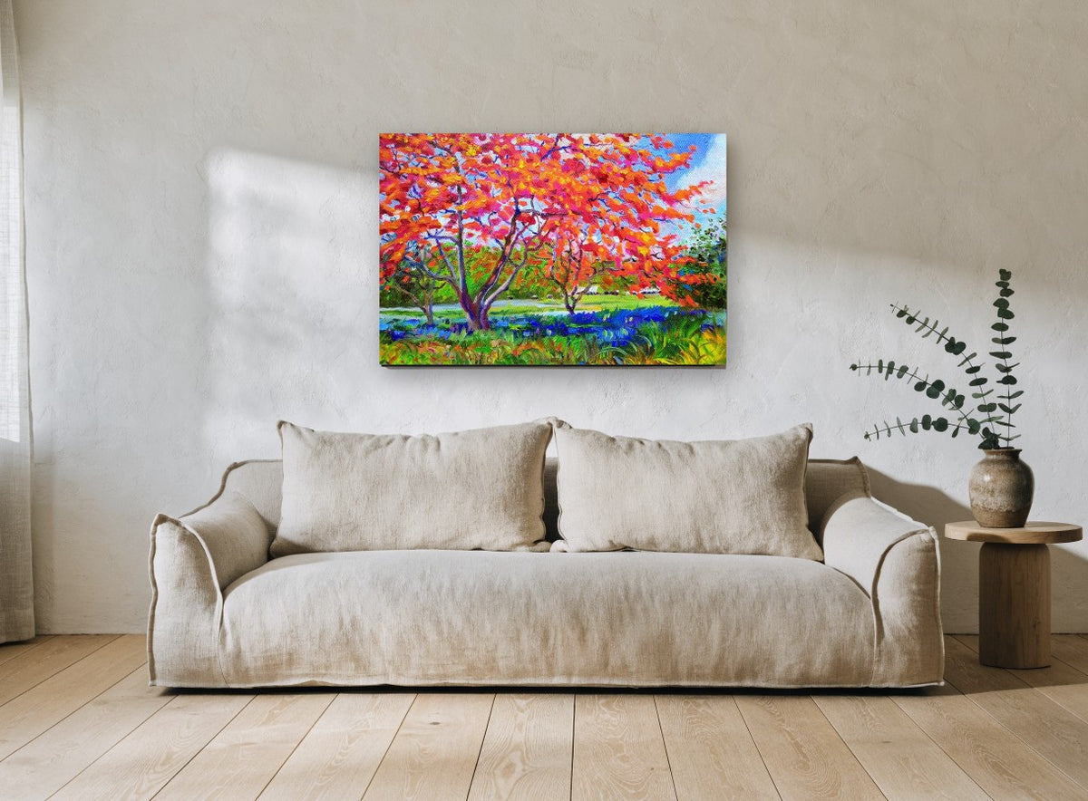 Flame Tree Meadow floral canvas print on the wall of a living room
