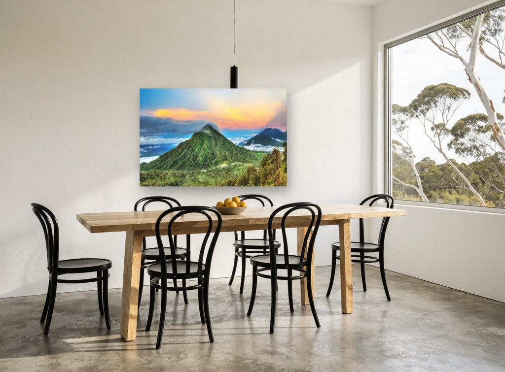 Cloud-Capped Green Peak landscape canvas print on the wall of a dining room