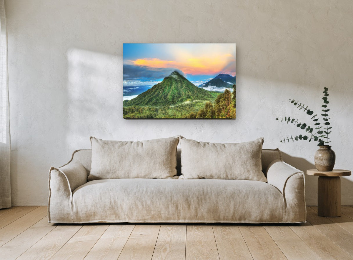 Cloud-Capped Green Peak landscape canvas print on the wall of a living room