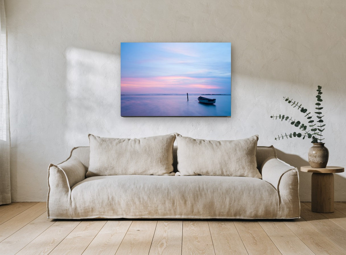 Moored at Dusk coastal canvas print on the wall of a living room