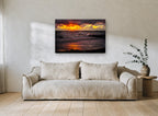 Ember Sky Storm Surf coastal canvas print on the wall of a living room