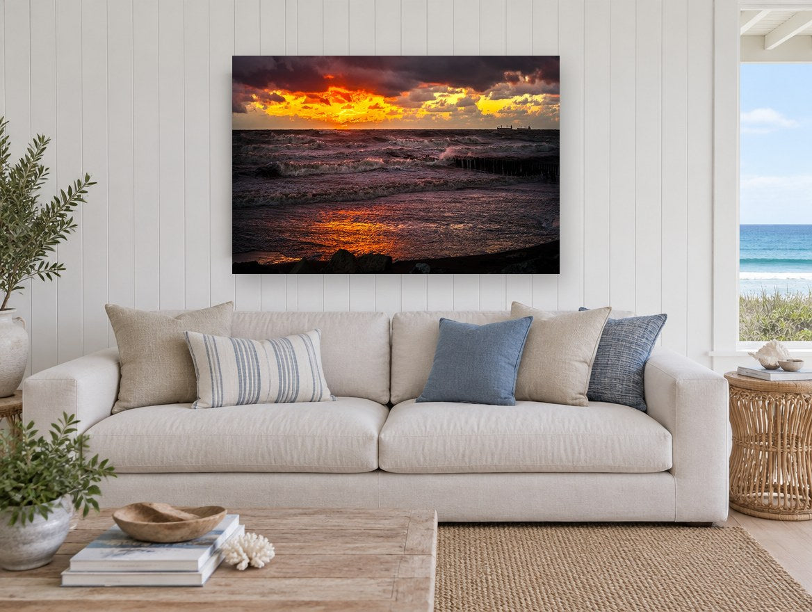 Ember Sky Storm Surf coastal canvas print on the wall of a beach house living room