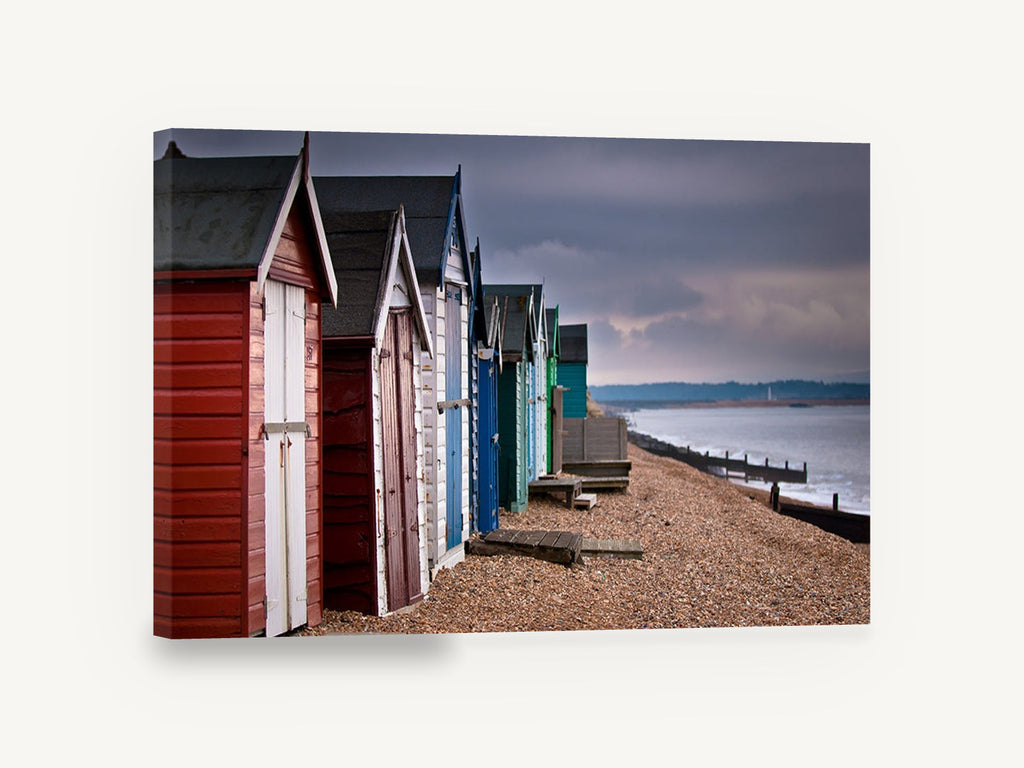 Stormlight Beach Huts, beach huts pebble shore photograph, coastal canvas wall art print ready to hang