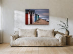 Stormlight Beach Huts coastal canvas print on the wall of a living room