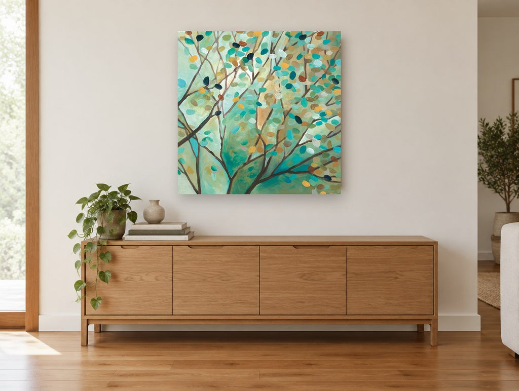 Verdigris Branch Mosaic landscape canvas print on the wall of a living room above a sideboard