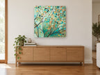 Verdigris Branch Mosaic landscape canvas print on the wall of a living room above a sideboard